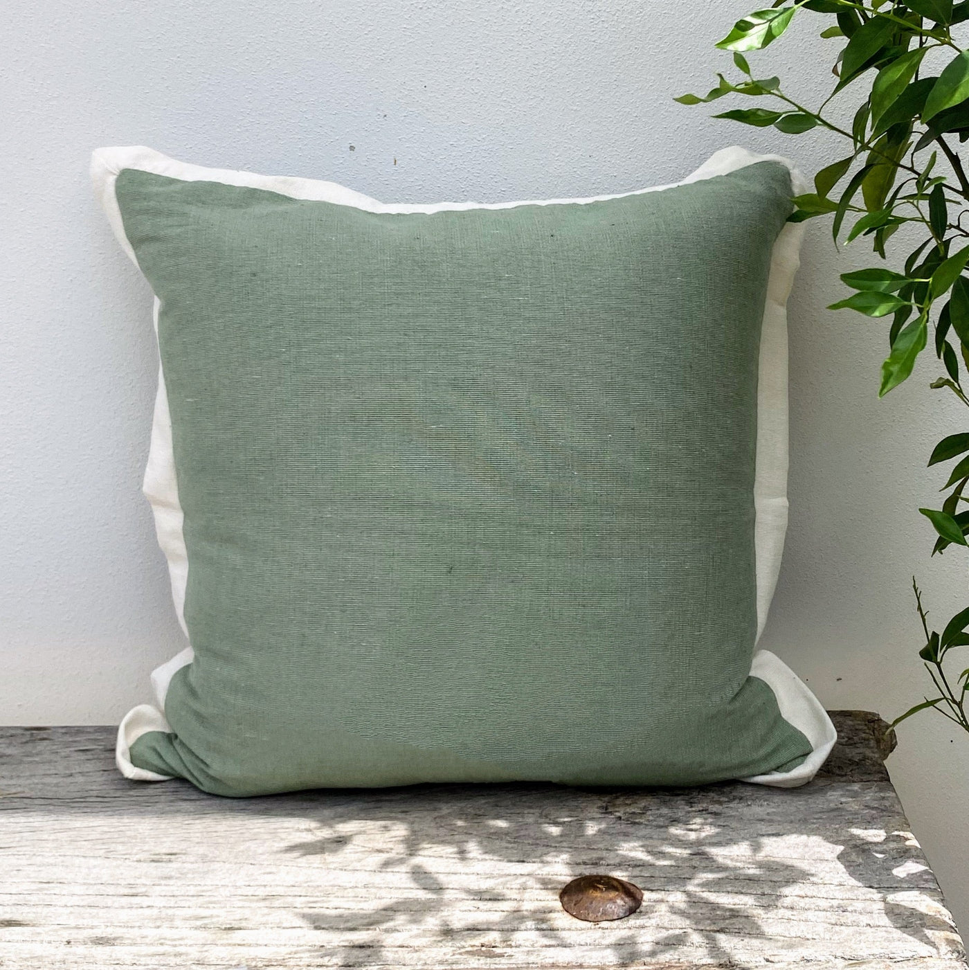 Add a Beach Vibe with This Olive Green Cushion