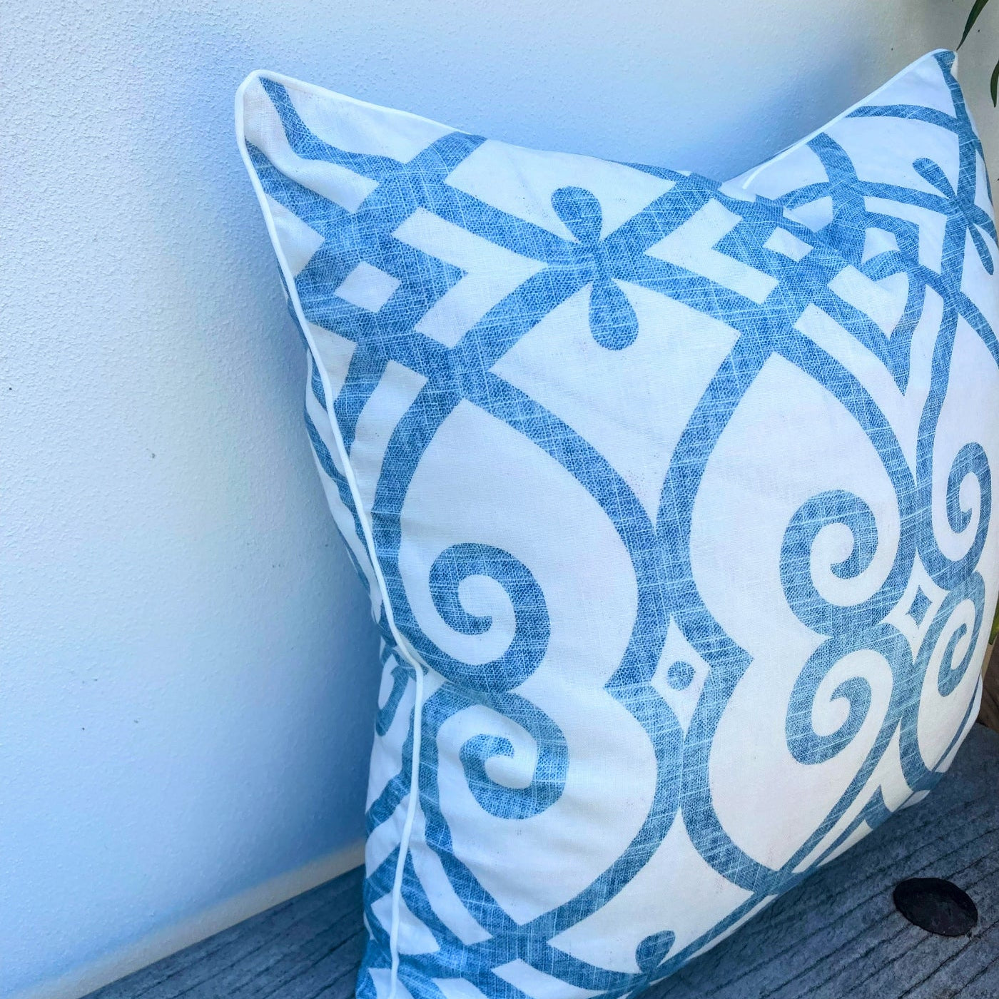 Blue and White Patterned Cushion