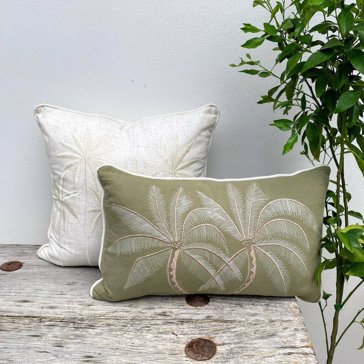 Set of two live green and white palm tree cushion