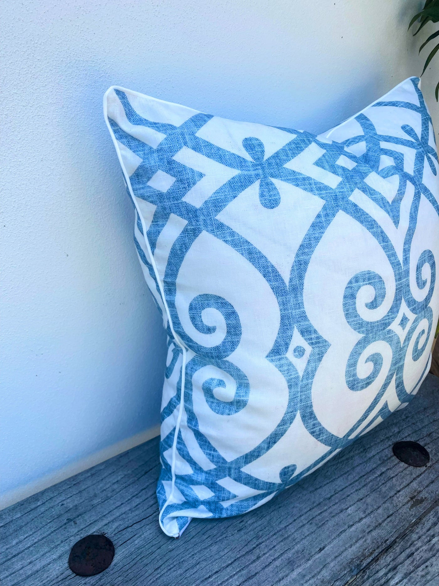 Blue and White Patterned Cushion
